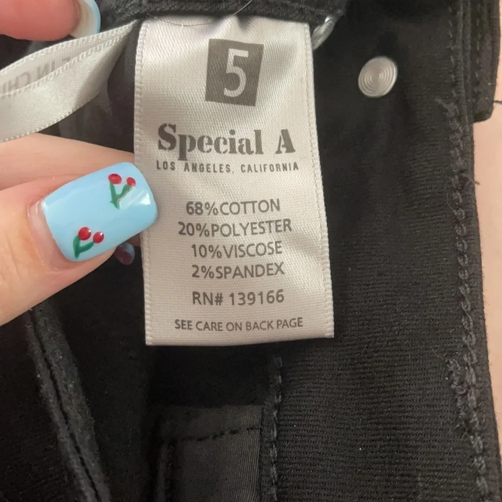 Special A Size 5 slight Distressed stretchy jeans